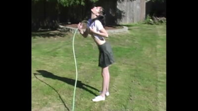Zoe Plays with Water Hose Wetting Pierced Tits & Her Pussy